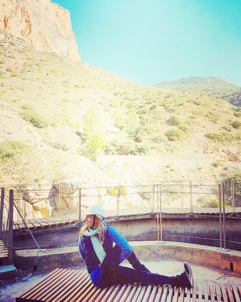 Yoga Pose Nette Nirmala in Marichyasana on the Caminito del Rey