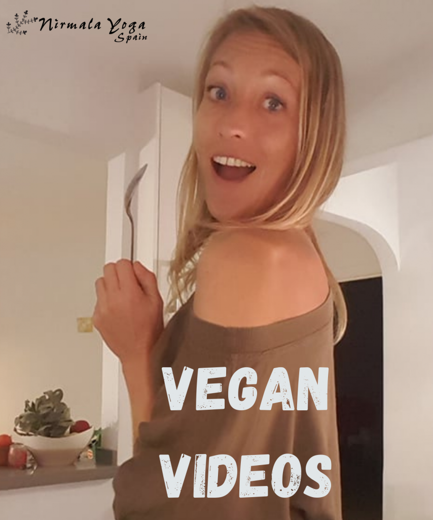 Photo of Nirmala Yoga in the kitchen with text: Vegan Videos