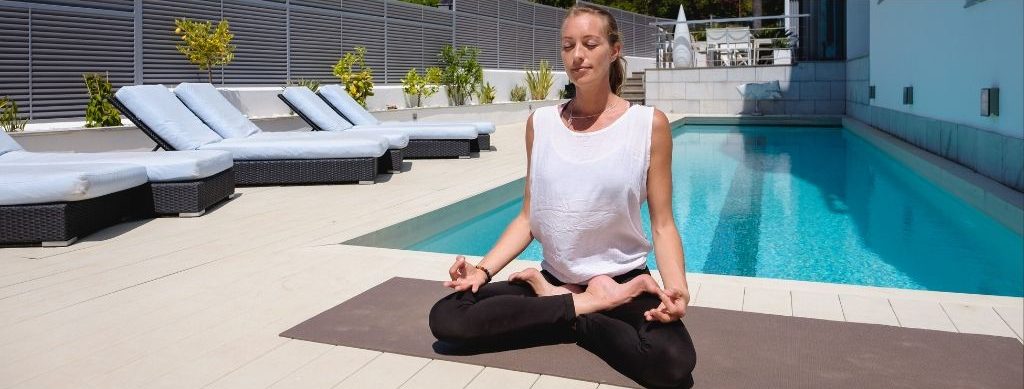 Sukasana Yoga Pose for getting into meditation by Nirmala Yoga Spain