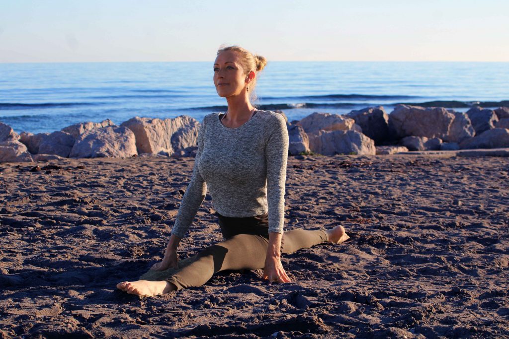 Hanumanasana Yoga Pose by the sea. Nirmala Yoga, Estepona by Fox No Limits