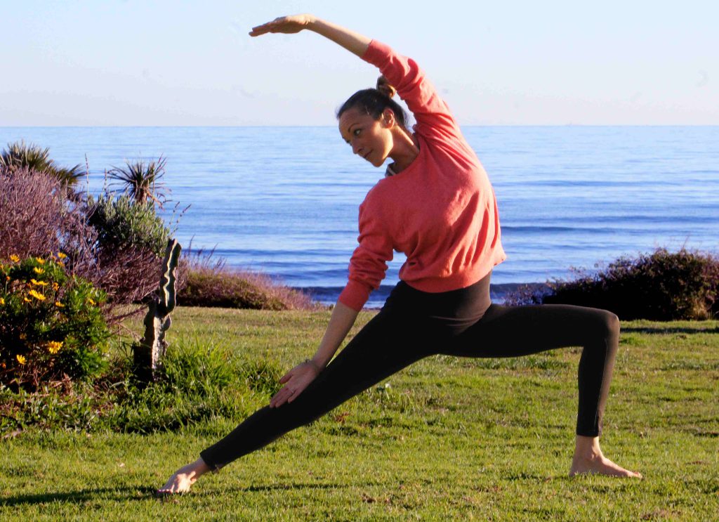 Beachside Yoga in Estepona with Nirmala Yoga Reverse Warrior Pose Fox No Limits